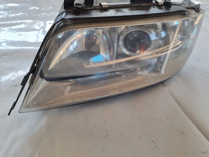 Priekšējais kreisais lukturis priekš AUDI A6 1998